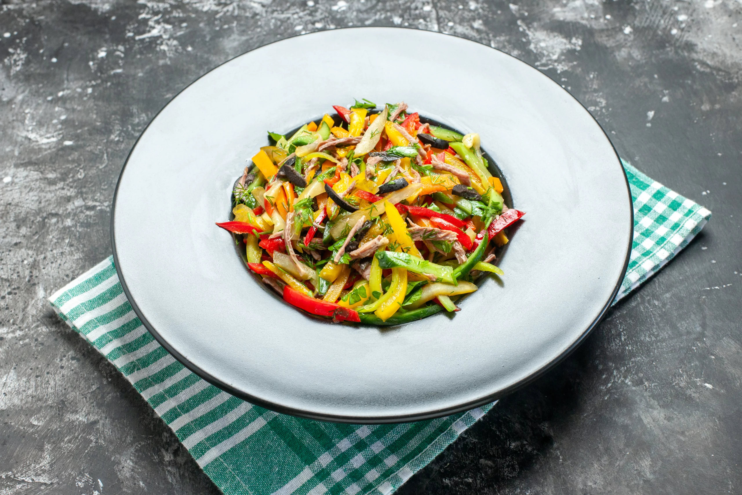 front-view-vegetable-salad-inside-plate-grey-table